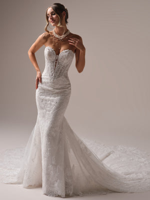 Strapless lace mermaid wedding dress with sweetheart neckline, sheer corset bodice, and elegant chapel train.
